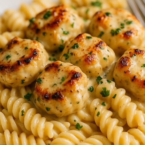 Creamy Garlic Parmesan Chicken Bites with Cheesy Twisted Pasta